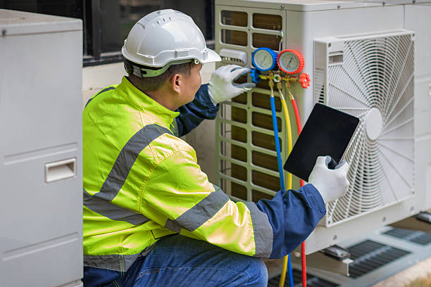 Professional Air Conditioning Repair technician working in Hingham, WI